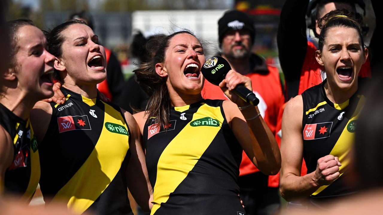 Richmond players belt out the club song after knocking off top-placed Brisbane. Picture: Daniel Carson/AFL Photos via Getty Images