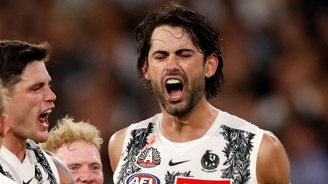 MELBOURNE, AUSTRALIA - APRIL 25: Brodie Grundy of the Magpies celebrates a goal with teammates during the 2022 AFL Round 06 match between the Essendon Bombers and the Collingwood Magpies at the Melbourne Cricket Ground on April 25, 2022 in Melbourne, Australia. (Photo by Dylan Burns/AFL Photos via Getty Images)