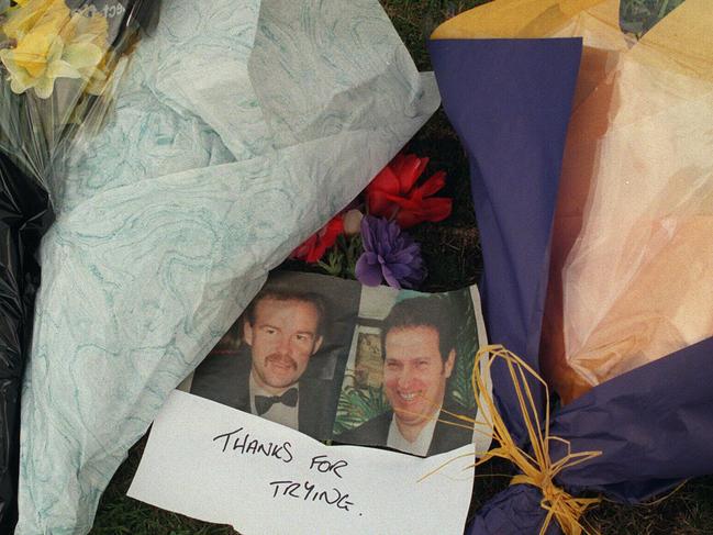 Floral tributes for police officers Rodney Miller and Gary Silk.