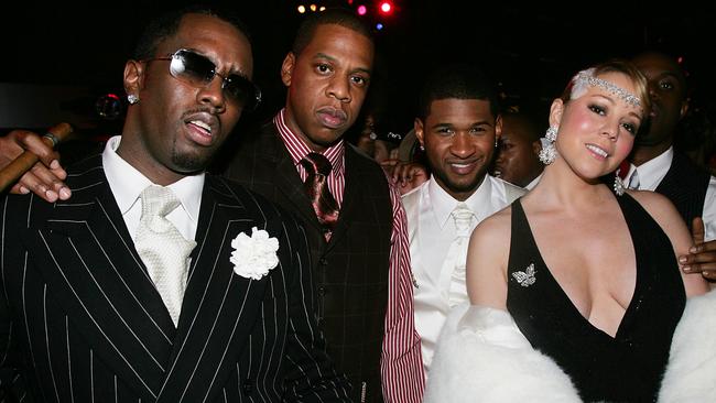 Sean "P.Diddy" Combs, Jay-Z, Usher, and Mariah Carey at the 26th Birthday party for Usher in October 2004. Picture: Frank Micelotta/Getty Images