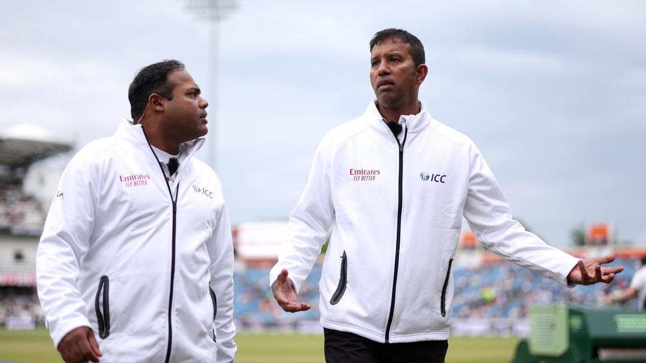 Umpires Kumar Dharmasena and Nitin Menon inspect the playing conditions. Picture: Getty