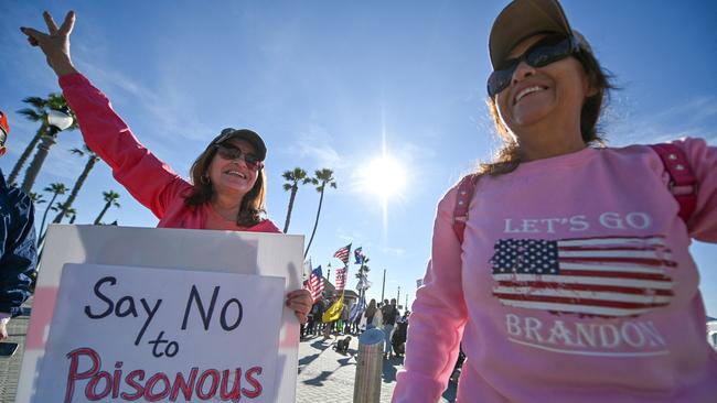 A woman wears a "Let's Go, Brandon" during a protest against Covid-19 vaccine mandates. Picture: AFP.