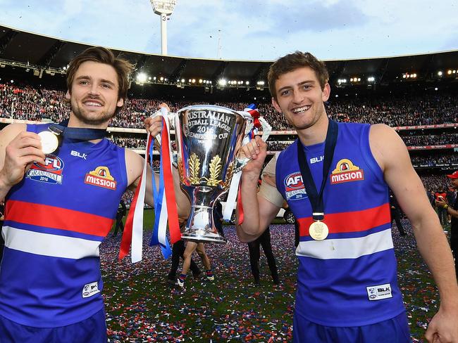 Joel Hamling and Fletcher Roberts (right) after playing in the Bulldogs premiership.