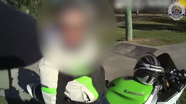 Police pull over a motorbike rider as part of Operation Cold Snap.