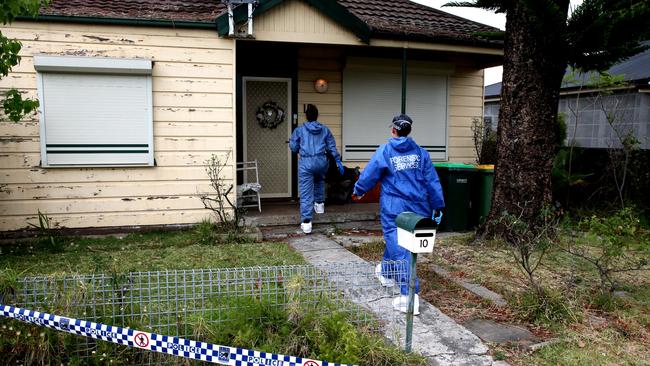 Forensic officers search a Granville property just streets away from the Diec family home.