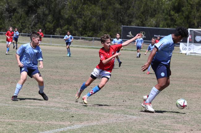 The Premier Invitational football tournament on the Gold Coast. Gold Coast Knights Red v Springfield United under-13s in action. Picture: Mike Batterham.