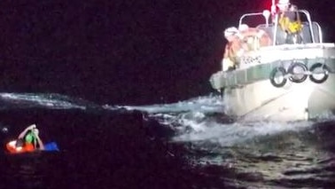 A crew member being rescued. Picture: Reuters