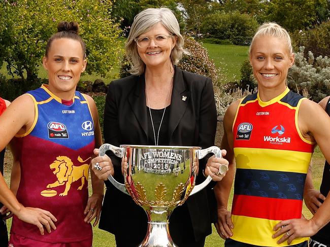 MELBOURNE, AUSTRALIA - JANUARY 30: 2018 AFL Cup Ambassador Sam Mostyn (centre) poses for a photograph with the AFLW Captains (L-R) Amanda Farrugia of the Giants, Stephanie Chiocci of the Magpies, Daisy Pearce of the Demons, Emma Zielke of the Lions, Erin Phillips of the Crows, Brianna Davey of the Blues, Katie Brennan of the Bulldogs and Kara Donnellan of the Dockers pose for a photograph during the 2018 AFLW Season Launch on January 30, 2018 in Melbourne, Australia. (Photo by Michael Willson/AFL Media)