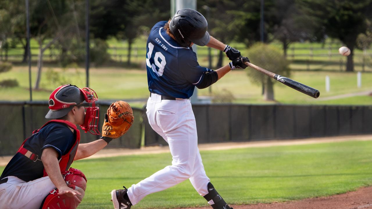 Baycats player Tanner Riley makes solid contact. Picture: Jackson Geall.