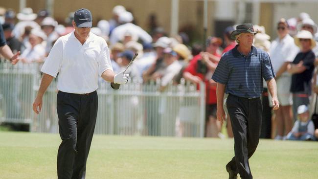 Nick Faldo and Greg Norman during the Australian Open in 2000. Picture: David Geraghty