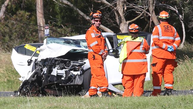 Emergency services at the scene of a road fatality in Portarlington on Friday. Picture: Mark Wilson