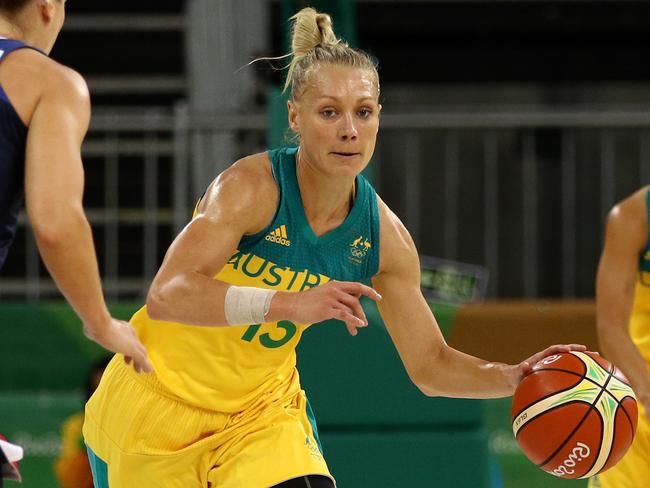 RIO DE JANEIRO, BRAZIL - AUGUST 09: Erin Phillips #13 of Australia dribbles up the court in front of Gaelle Skrela #12 of France in the Women's Preliminary Round Group A match between Australia and France on Day 4 of the Rio 2016 Olympic Games at Youth Arena on August 9, 2016 in Rio de Janeiro, Brazil. (Photo by Patrick Smith/Getty Images)