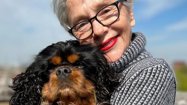 Australian Petal Ashmole, 76, who moved from Perth to London when she was 18 to become a dancer with the Royal Ballet, is taking her King Charles spaniel, Winston, to the street party. Picture: Diana Maclean