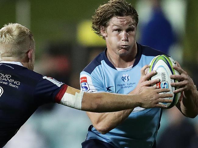 SYDNEY, AUSTRALIA - AUGUST 29: Michael Hooper of the Waratahs Is tackled by Andrew Deegan of the Rebels during the round nine Super Rugby AU match between the Waratahs and the Melbourne Rebels at Leichhardt Oval on August 29, 2020 in Sydney, Australia. (Photo by Mark Metcalfe/Getty Images)