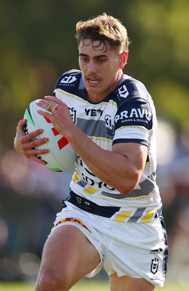 Tom Duffy of the Cowboys runs with the ball during the 2025 NRL Pre-Season Challenge match between Melbourne Storm and North Queensland Cowboys at Casey Fields on February 23, 2025 in Melbourne, Australia. (Photo by Morgan Hancock/Getty Images)