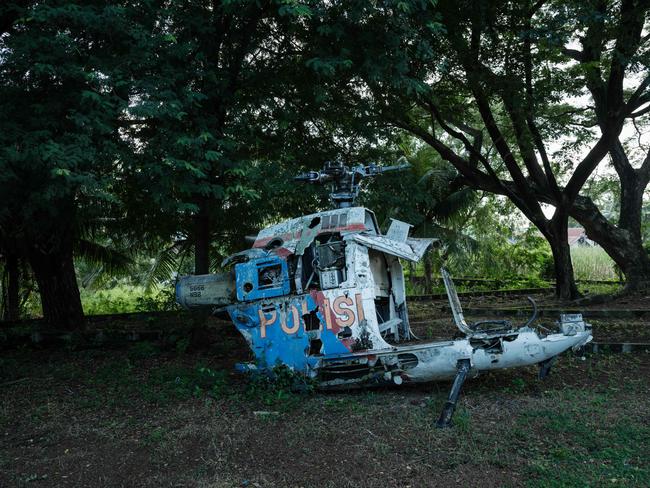 A destroyed police helicopter from the 2004 Indian Ocean tsunami displayed next to the Ulee Lheue Mass Grave in Banda Aceh. Picture: AFP