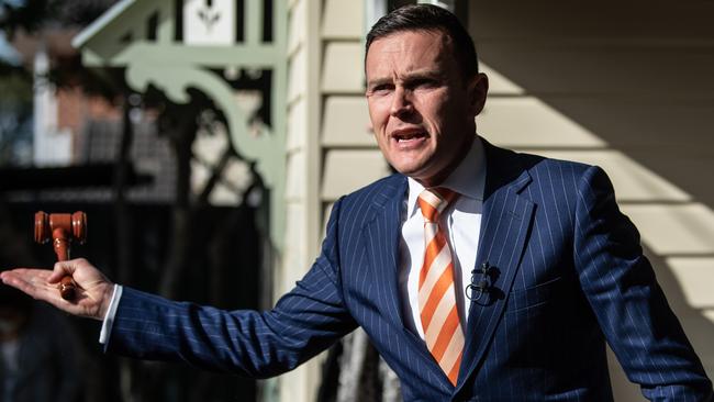 Damien Cooley conduct an auction in Sydney’s Epping. Picture: James Gourley