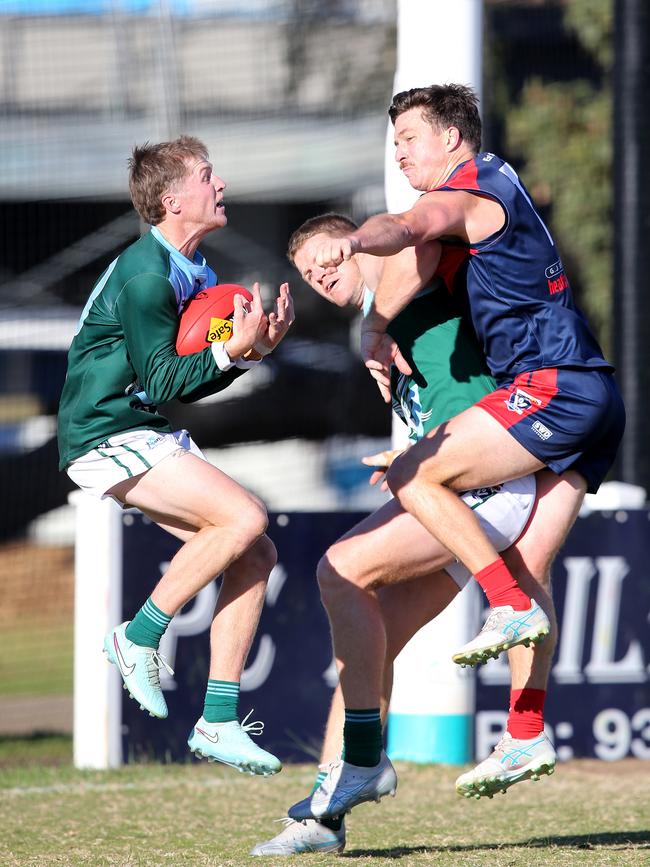 BFNL - Portarlington v Geelong Amateurs.  Geelong Amateurs Harrison Orr marks. Picture Mike Dugdale