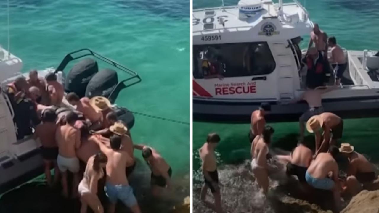 Lifeguards had to yell instructions to swimmers to get her to safety. Picture: 7 NEWS