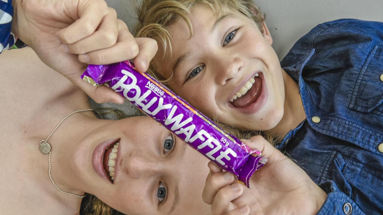 Lara and Daniel Sims with an original Polly Waffle bar. Picture: File