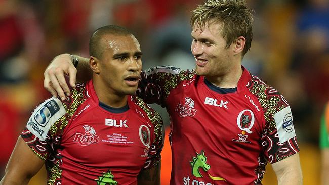 Qld Reds vs The Highlanders, at Suncorp Stadium. Will Genia and Ben Lucas after the win. Pic Jono Searle