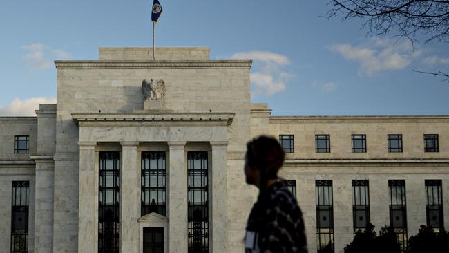 A pedestrian walks past the Marriner S. Eccles Federal Reserve building in Washington, DC: Picture: Bloomberg