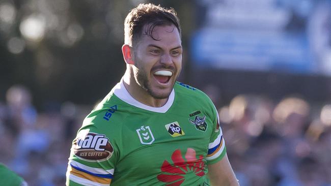 Aidan Sezer kicks the winning field goal against the Cronulla Sharks.