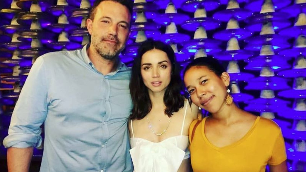 Ben Affleck and Ana de Armas pictured with a friend.