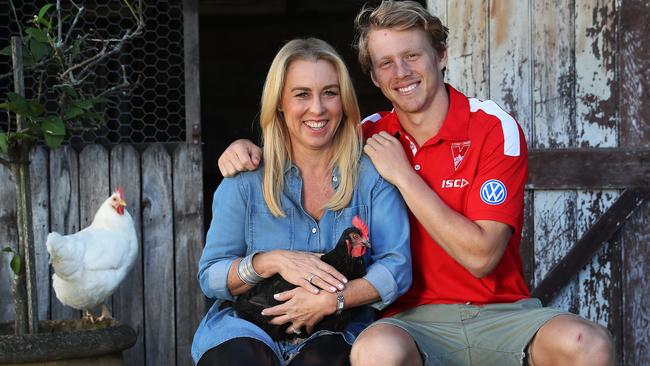 Callum Mills with mum Simone at the family property at Terry Hills. Picture. Phil Hillyard