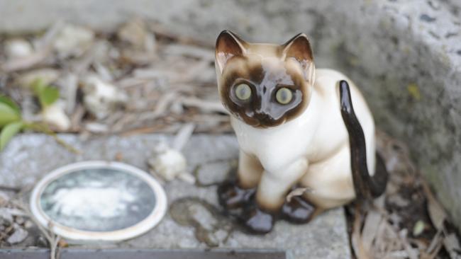 A memorial to a beloved pet cat in the animal cemetery in Rowville.