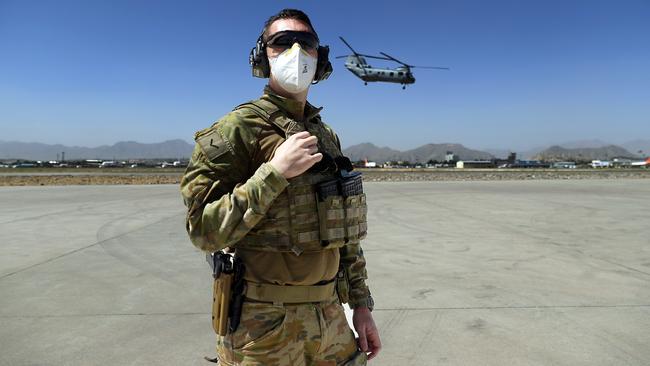 RAAF LAC Brian Duncan provides security around a C17 aircraft at the Hamid Karzai International Airport in Kabul, Afghanistan. Picture: Gary Ramage