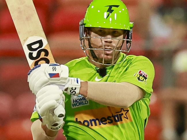 SYDNEY, AUSTRALIA - JANUARY 27: David Warner of the Thunder bats during the Men's Big Bash League match between the Sydney Thunder and the Brisbane Heat at Sydney Showground Stadium, on January 27, 2023, in Sydney, Australia. (Photo by Mark Evans - CA/Cricket Australia via Getty Images)