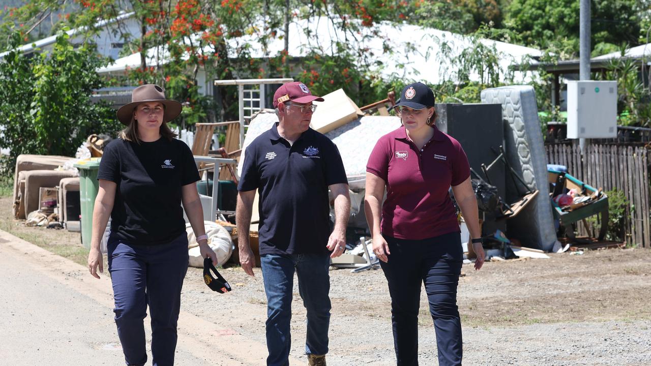 Senator Nita Green, federal Emergency Management Minister Murray Watt and Fire and Disaster Recovery Minister Nikki Boyd in Cairns. Picture: Annette Dew