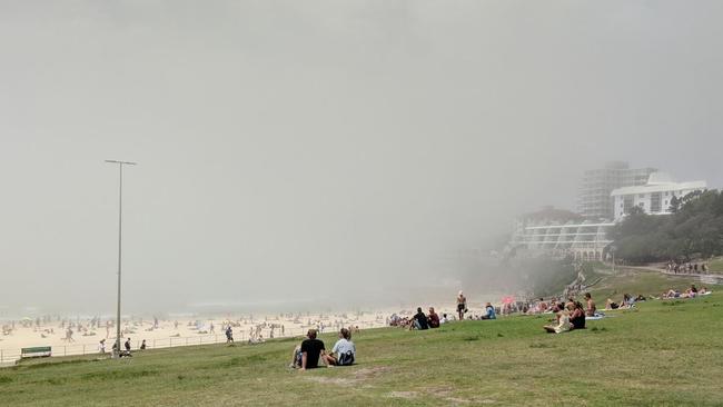 The water at Bondi can barely be seen due to a low-lying fog. Picture: Twitter/@mattshandsmith