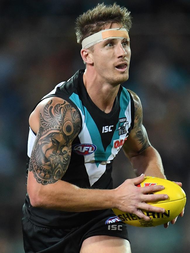 Port Adelaide’s Hamish Hartlett is action against Geelong at Adelaide Oval. Picture: Julian Smith/AAP