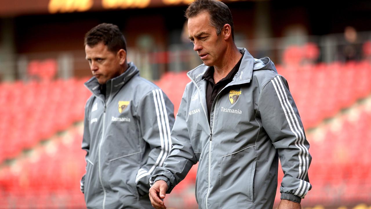 Alastair Clarkson and Brendon Bolton inspect the ground. Picture: Philip Hillyard