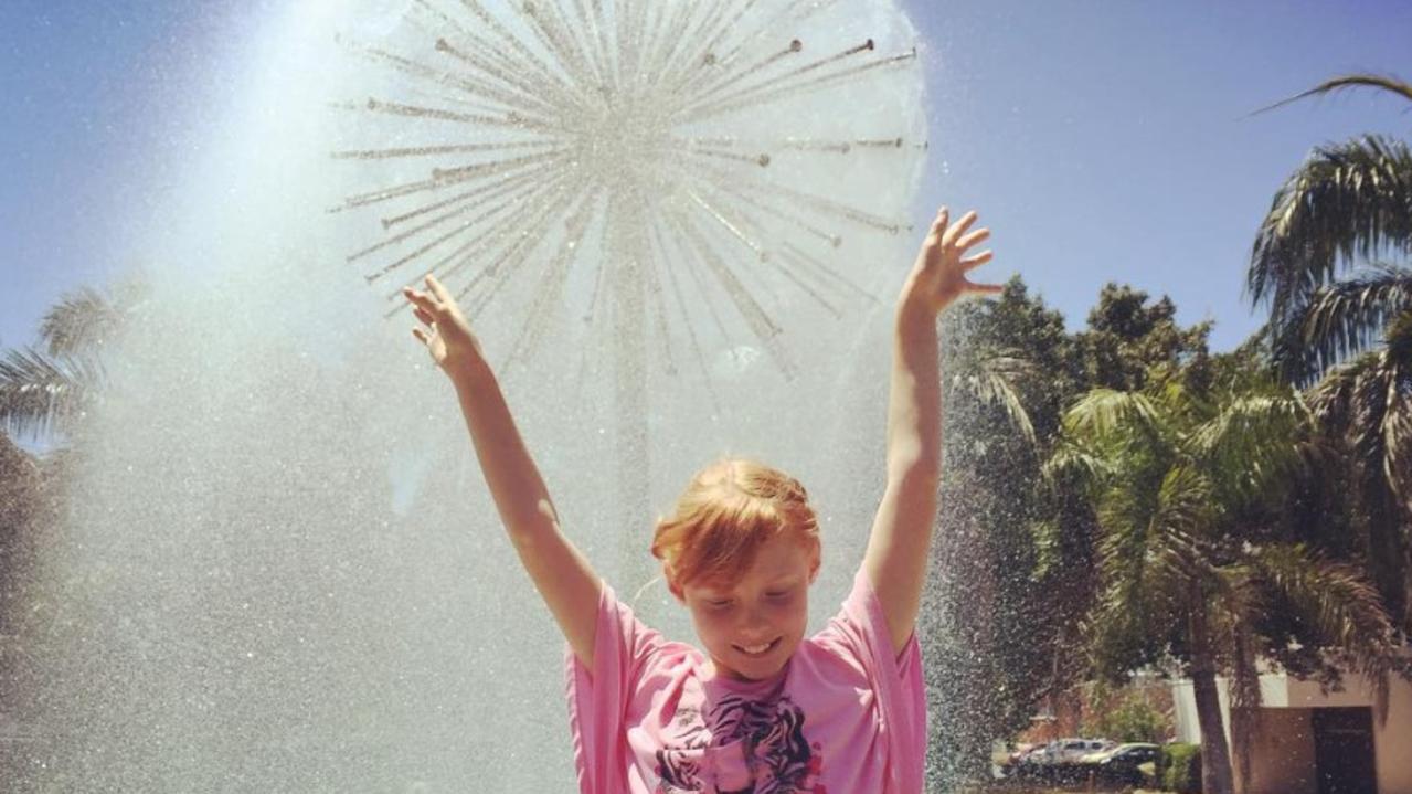 Chloe Waddell in front of the Mackay thistle fountain in-between Gordon St and Alfred St. Picture: Heidi Petith