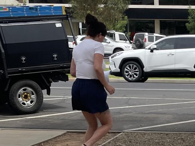 Lara Scarrott leaving court after receiving a one month sentence, suspended for 12 months,  for fleecing the ATO out of more than $35,000. Picture: Stuart Kavanagh