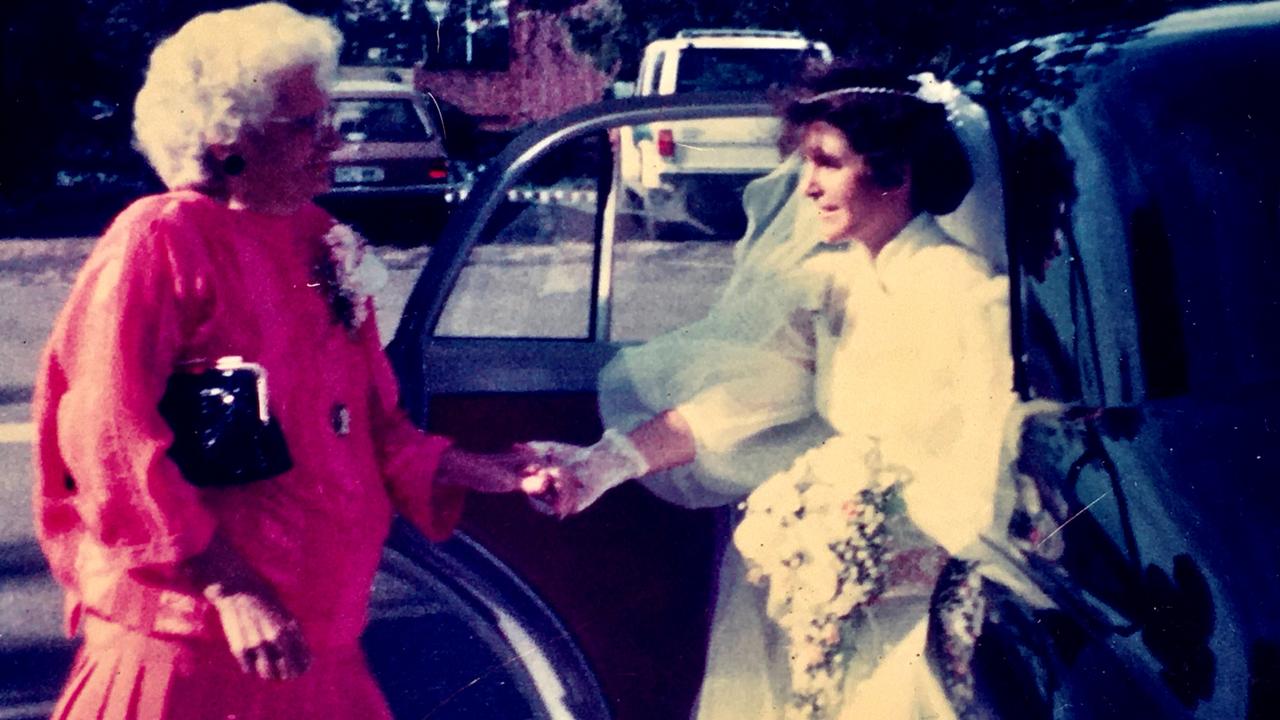 Mum greets me on my wedding day, ready to walk me down the aisle in 1986.