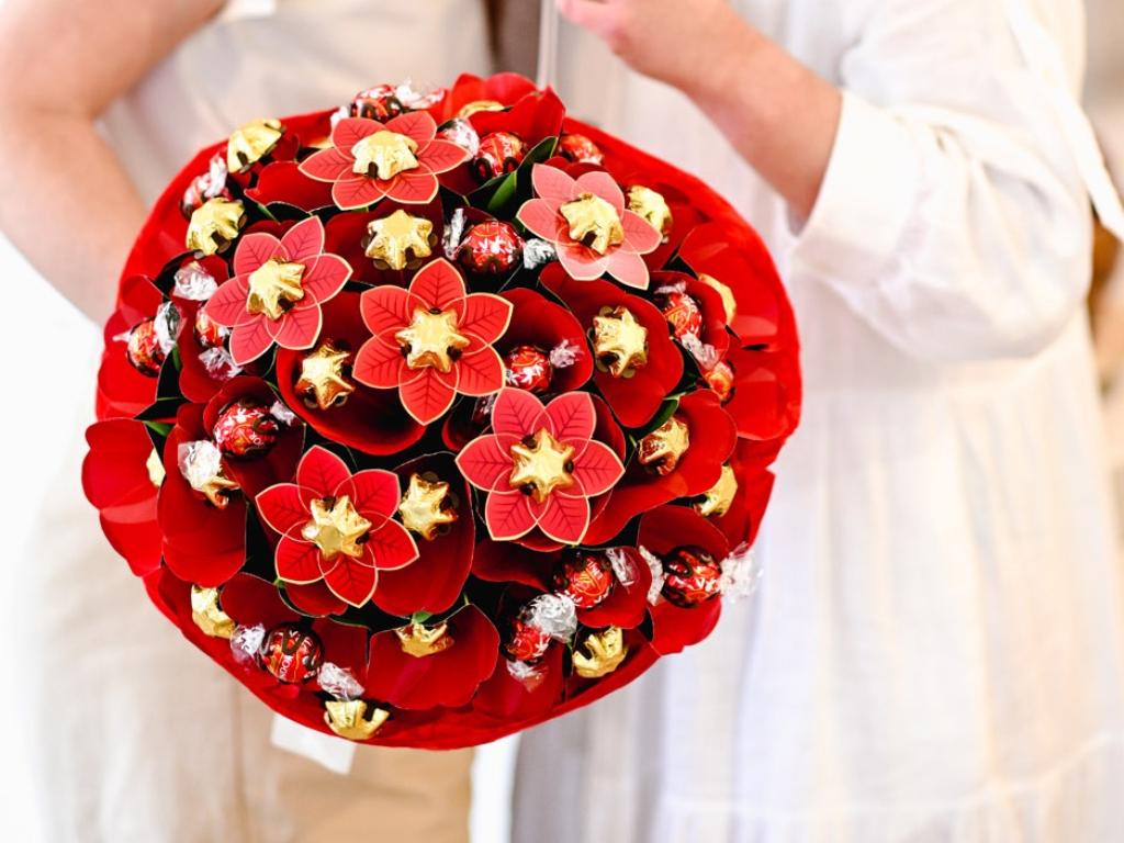 Flowers and chocolate. The perfect way to your friend's heart. Picture: Edible Blooms.