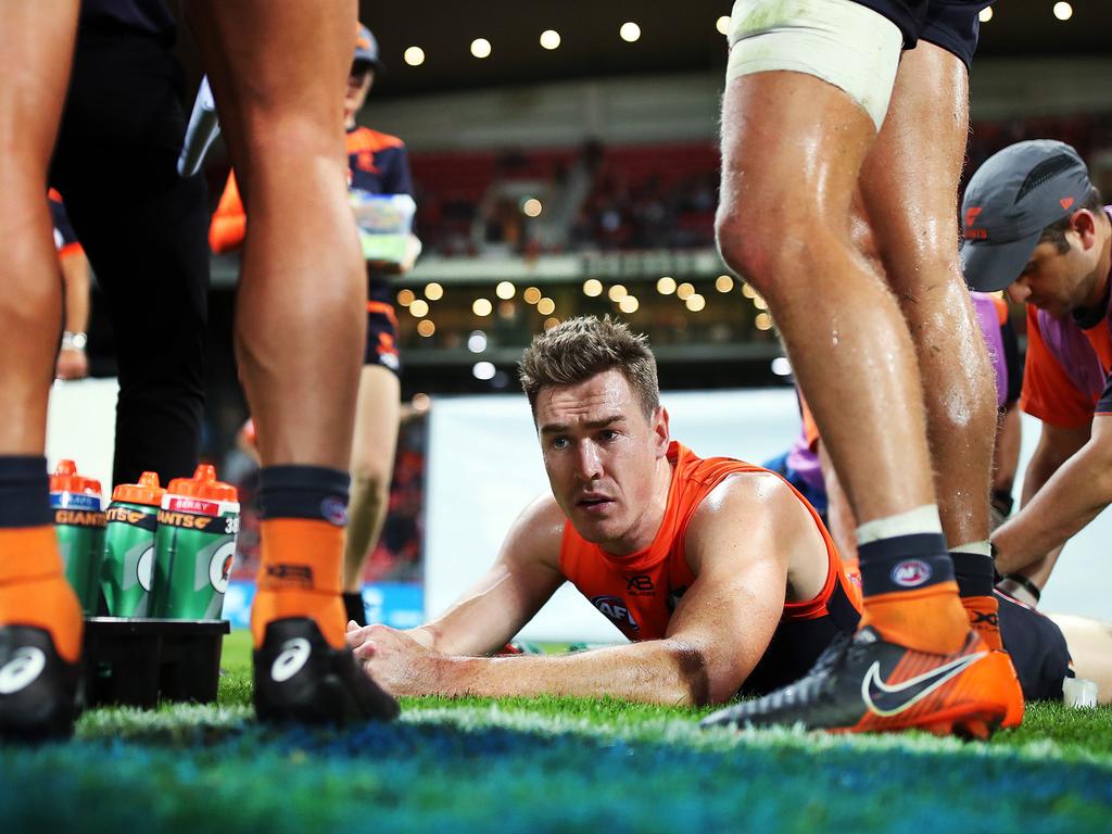 Giants Jeremy Cameron gets a massage at 3/4 time on the field. Picture: Phil Hillyard