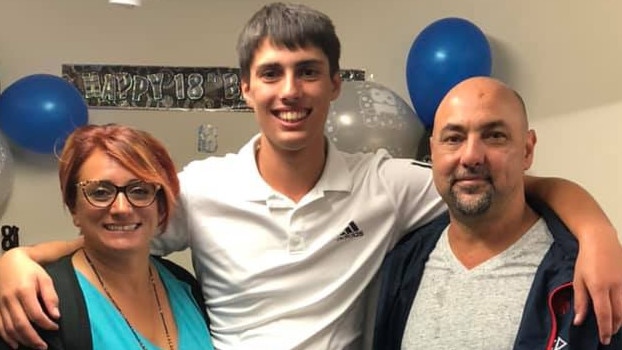 Christopher Cassaniti celebrating 18th birthday with his parents Patrizia and Rob.