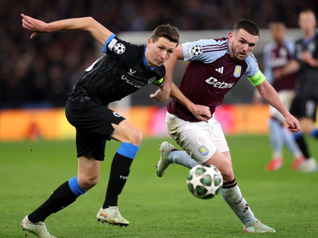 McGinn battles for possession with Club Brugge’s Hans Vanaken. Picture: Getty Images