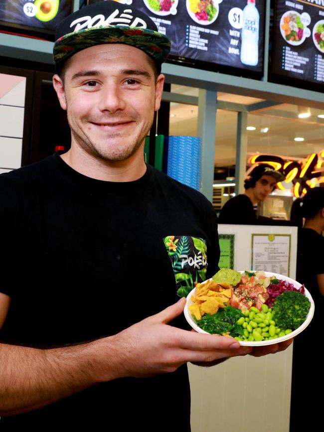 Poked’s Dylan Davis at the newly opened Macquarie Centre store. Picture: Angelo Velardo