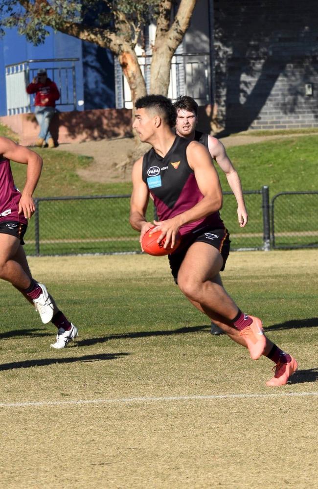 Ollie Sharpe on the move for Old Haileybury.