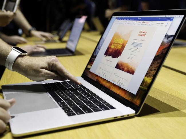 A MacBook is shown during an announcement of new products at the Apple Worldwide Developers Conference Monday, June 5, 2017, in San Jose , Calif. (AP Photo/Marcio Jose Sanchez)