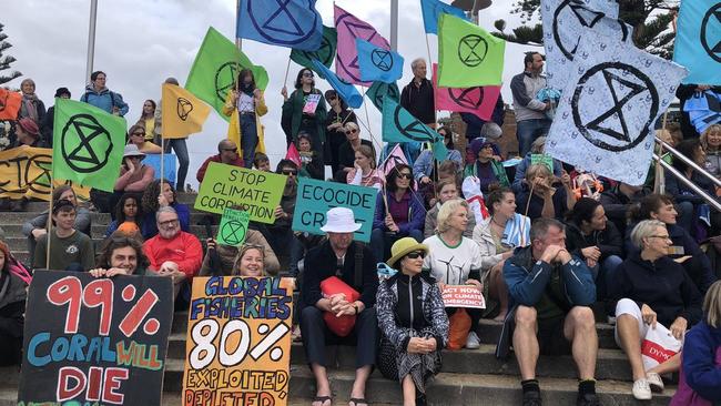 Extinction Rebellion "Spring Rebellion" Heads in the Sand protest on Sydney's Manly Beach. Picture: Julie Cross