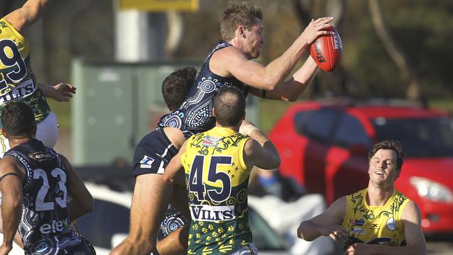 South Adelaide forward Sam Overall shows off his marking strength against the Eagles at Noarlunga Oval. Picture: Dean Martin/AAP