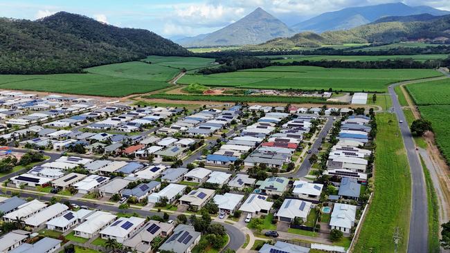 An aerial view (in the background) of the yet to be approved next stage of Kenfrost’s Mount Peter Residential Estate. Picture: Brendan Radke