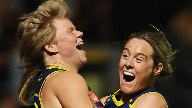 Jess Waterhouse (left) and Yvonne Bonner celebrate during the Crows’ comprehensive semi-final win over Sydney at Norwood Oval on Saturday. Picture: James Elsby / Getty Images